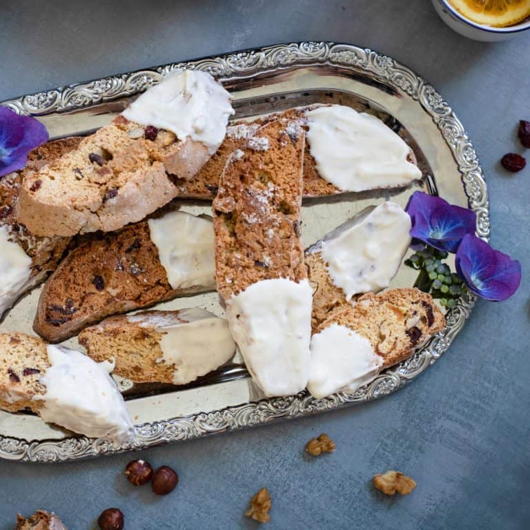 White chocolate Cranberry Biscotti on silver tray.