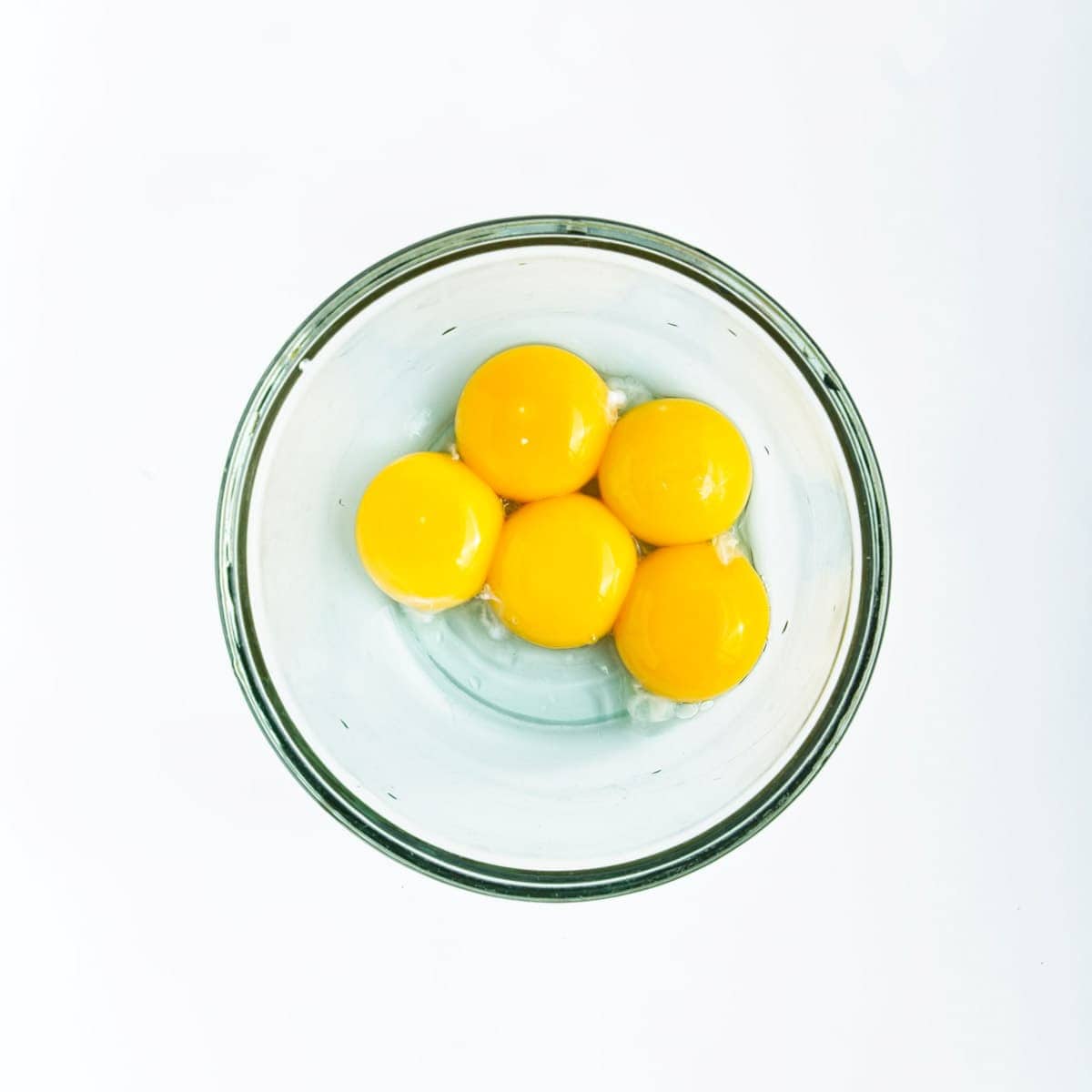 Eggs yolks in bowl.