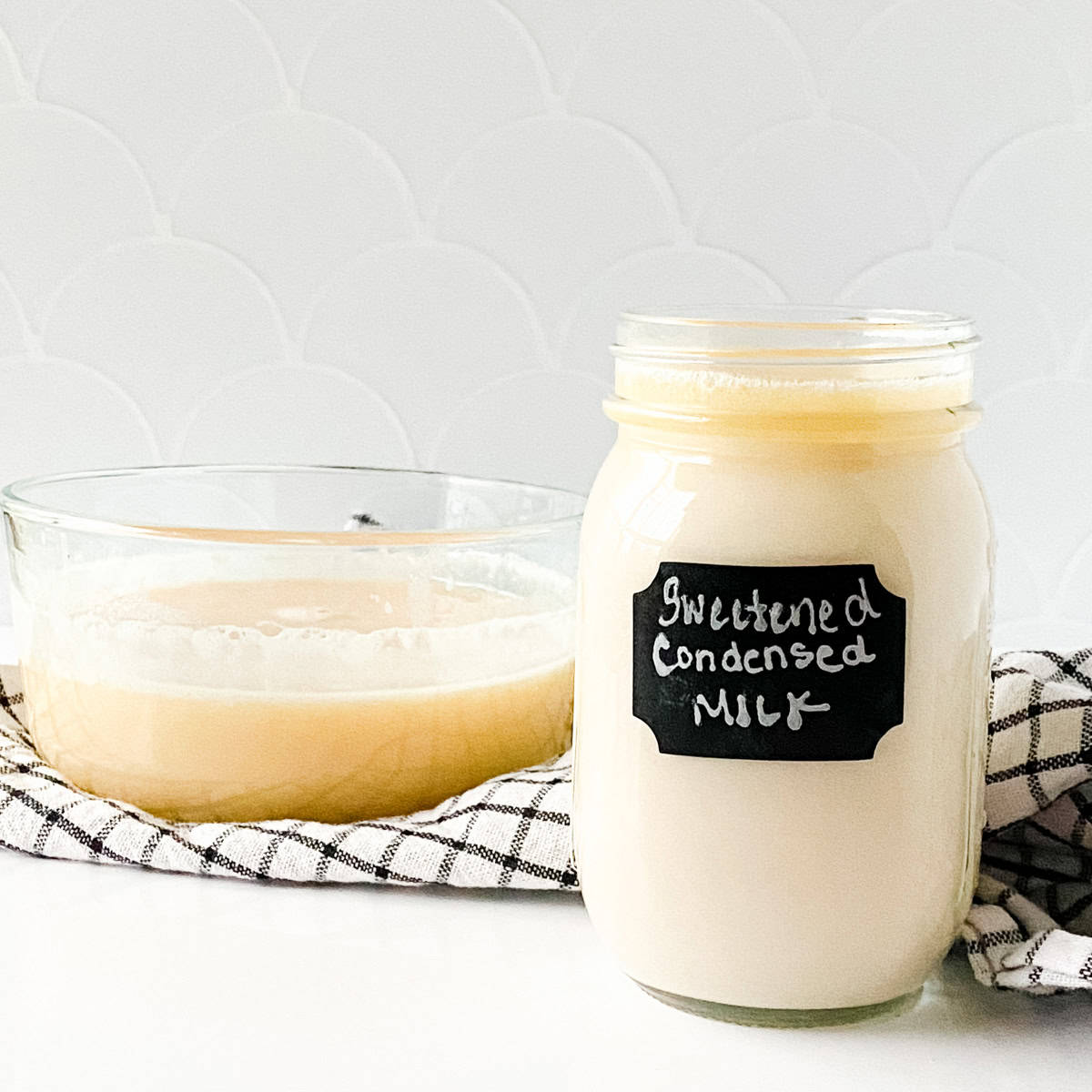 Jar of homemade sweetened condensed milk.